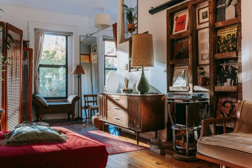 Vintage-style living room with mid-century furniture, vinyl records, and warm natural light.