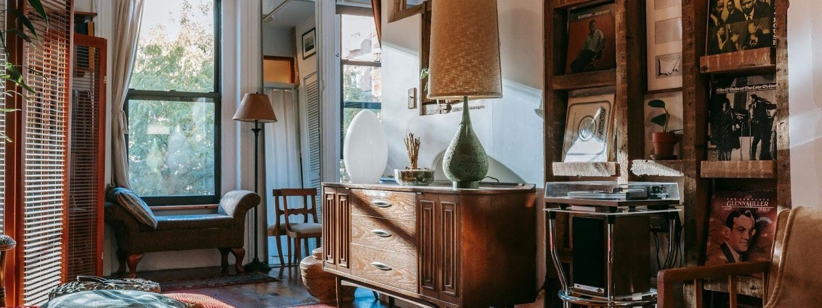 Vintage-style living room with mid-century furniture, vinyl records, and warm natural light.