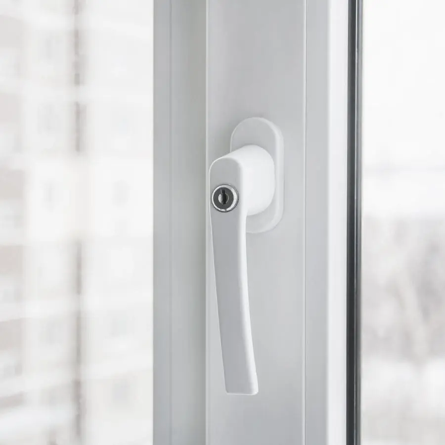 Close-Up of a White Window Handle
