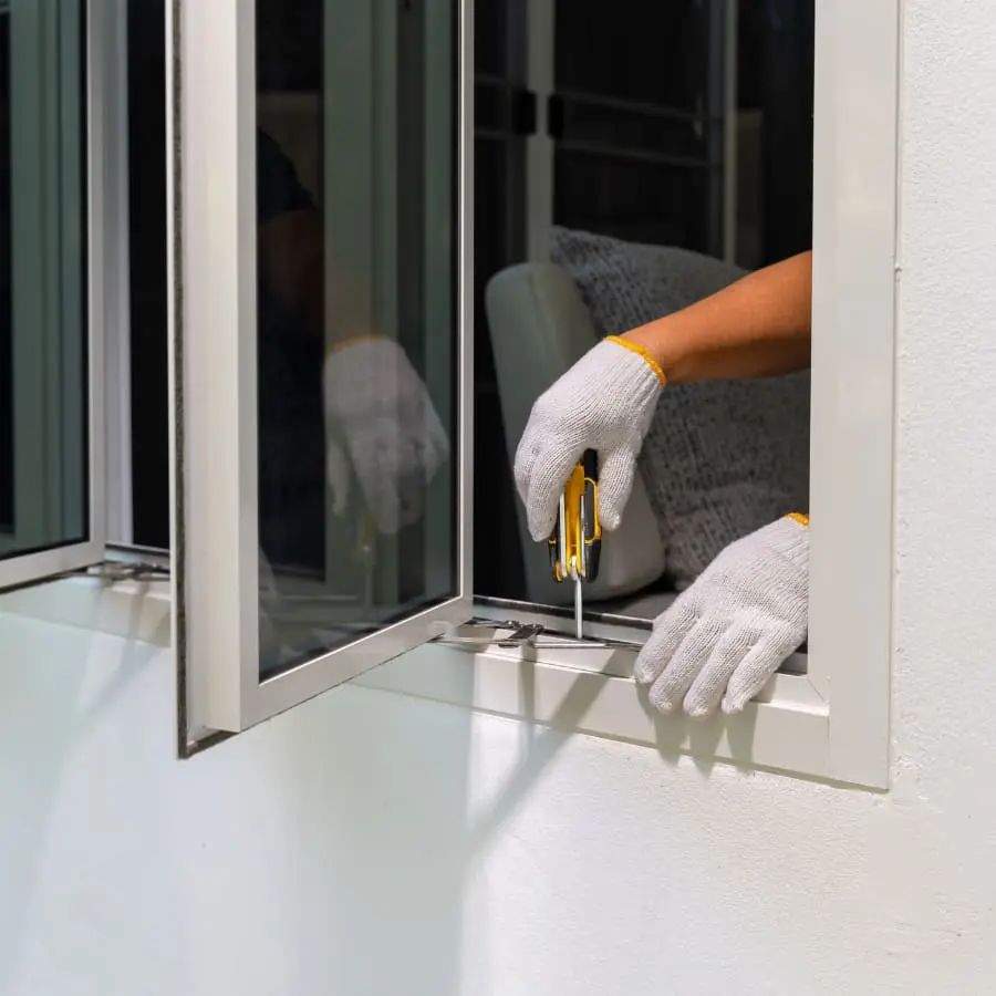 Technician Replacing Window