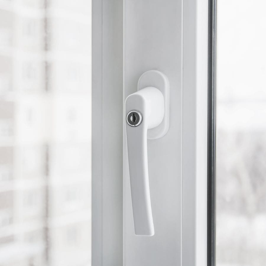Close-Up of a White Window Handle