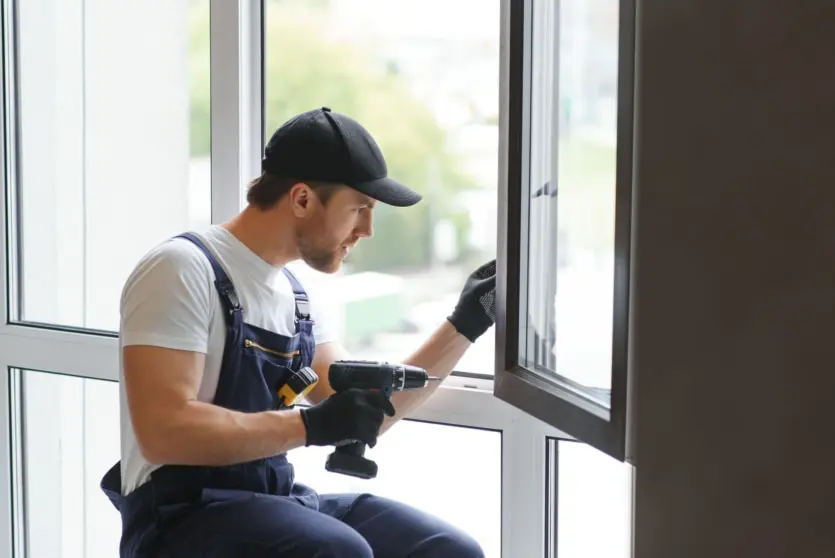 Window Installer Securing Replacement Window Frame