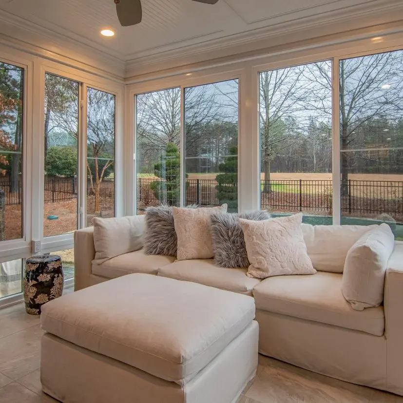 Bright Living Room With Large Windows And Sofa