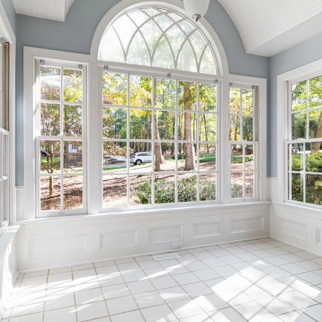 Large Arched Windows In Bright Sunroom
