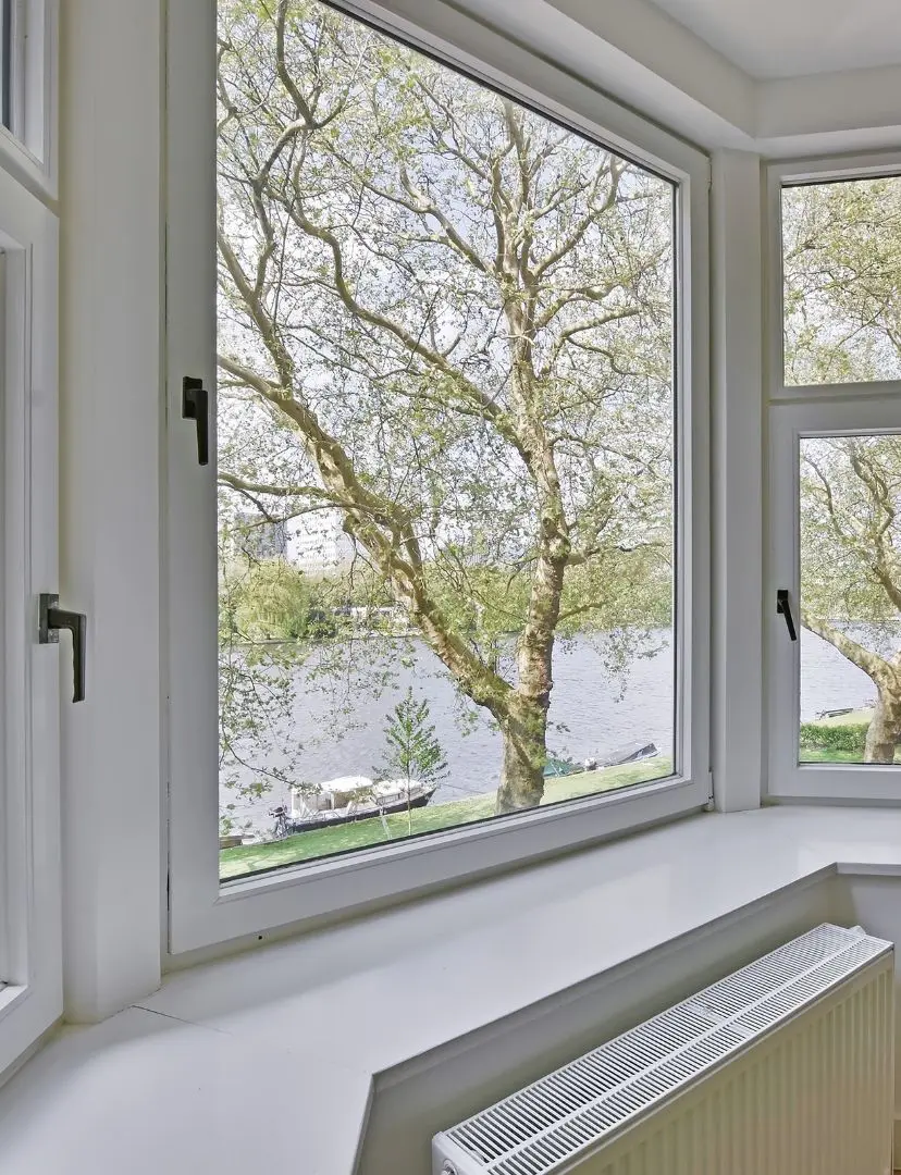 Large White Window With River And Tree View